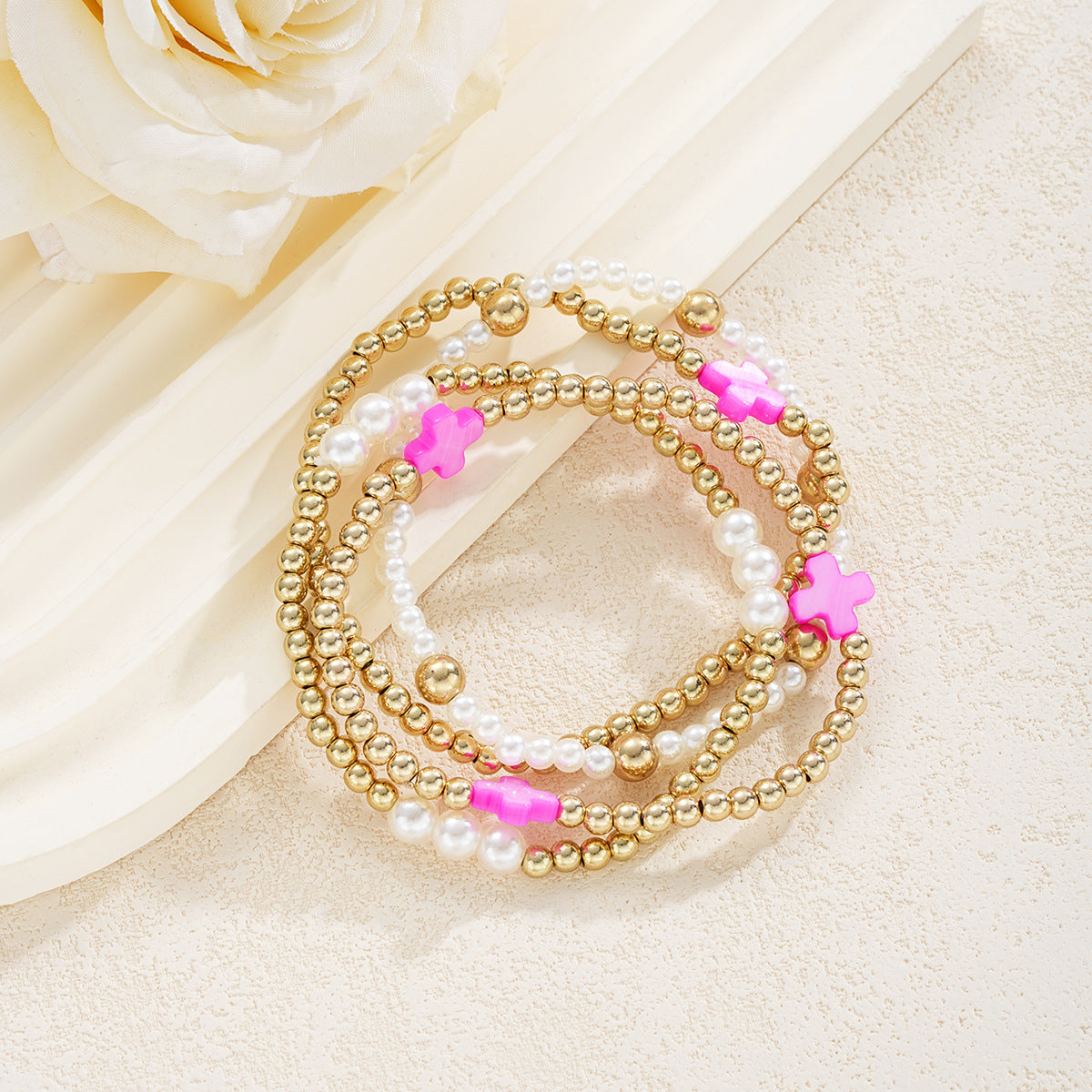 Damen Armband-Set mit eleganten Perlen- und Kreuzdetails Shop Nory