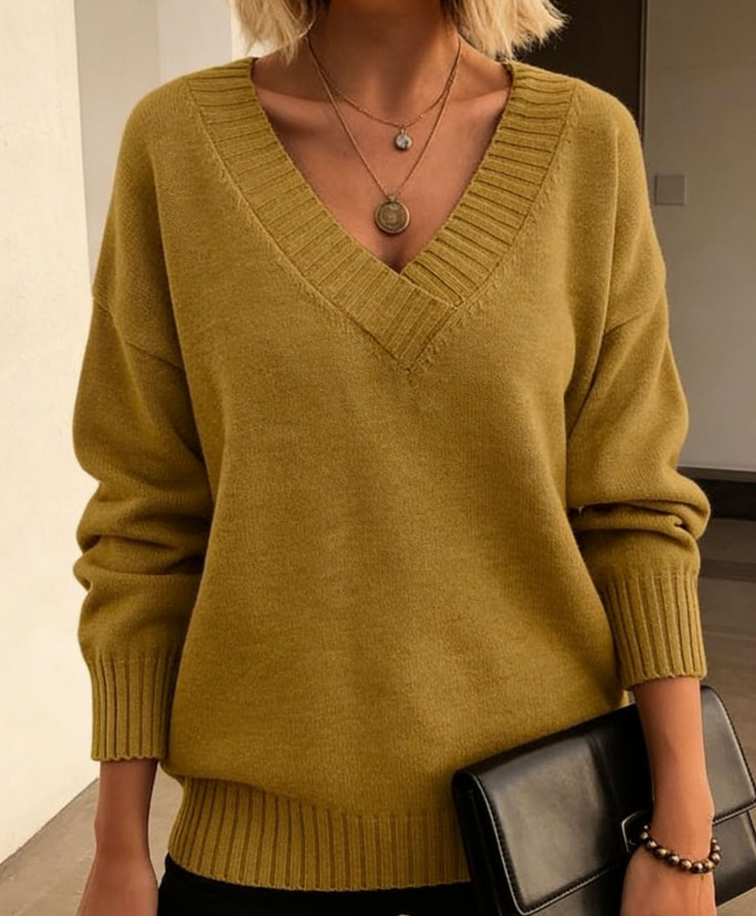 Damen Feinstrickpullover mit tiefem V-Ausschnitt und überschnittener Schulter Shop Nory