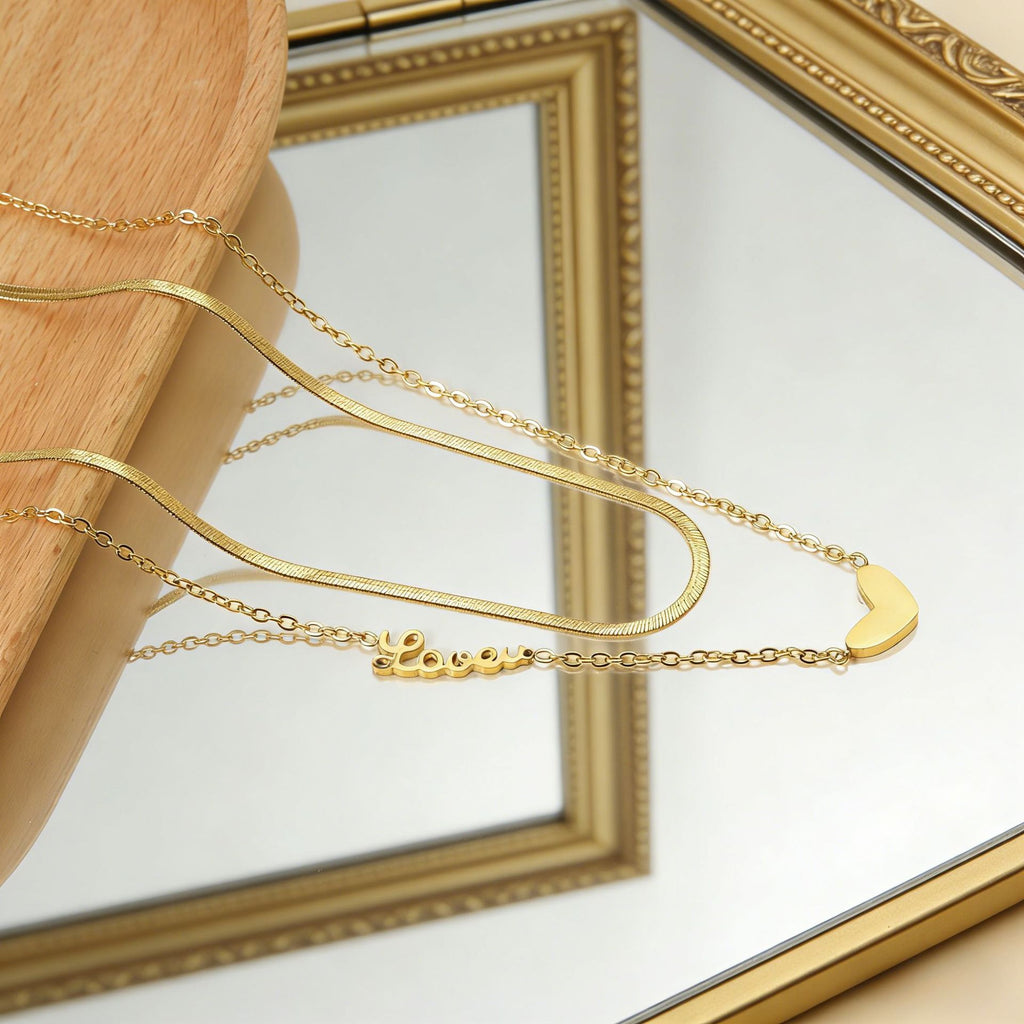 Damen Halskette mit goldplattiertem Herz-Anhänger und personalisiertem Namenszug Shop Nory
