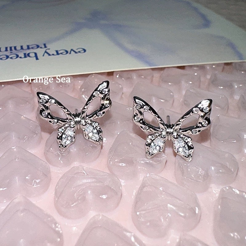 Damen Ohrstecker im Schmetterlingsdesign mit funkelnden Zirkonia Shop Nory