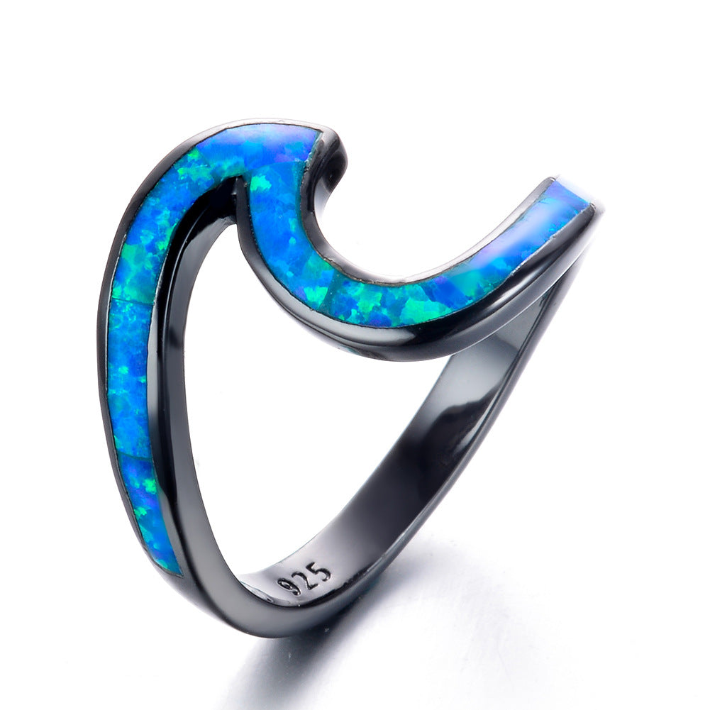 Damen Ring mit modernem Wellenmuster aus opalisierendem Stein Shop Nory