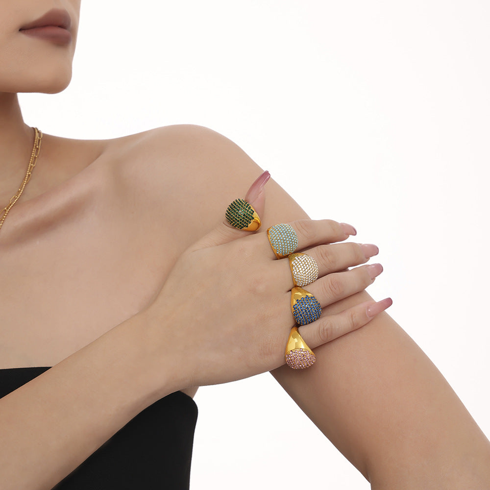 Damenring mit elegantem, goldbeschichtetem Design und Türkissteinbesatz Shop Nory