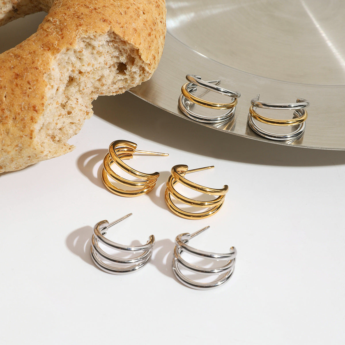 Damen Creolen Ohrhänger mit elegantem geschwungenem Design Shop Nory