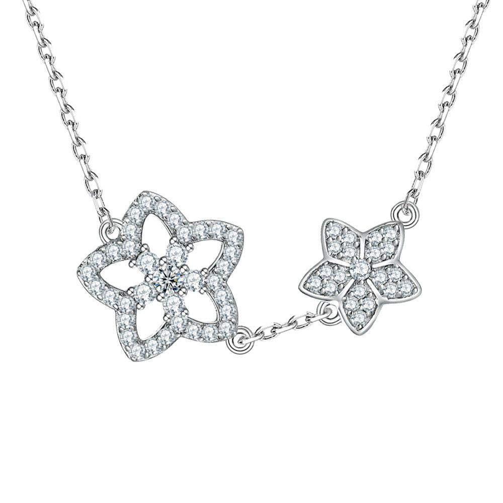 Damen Halskette mit floralen Anhängern und funkelnden Zirkonia Shop Nory