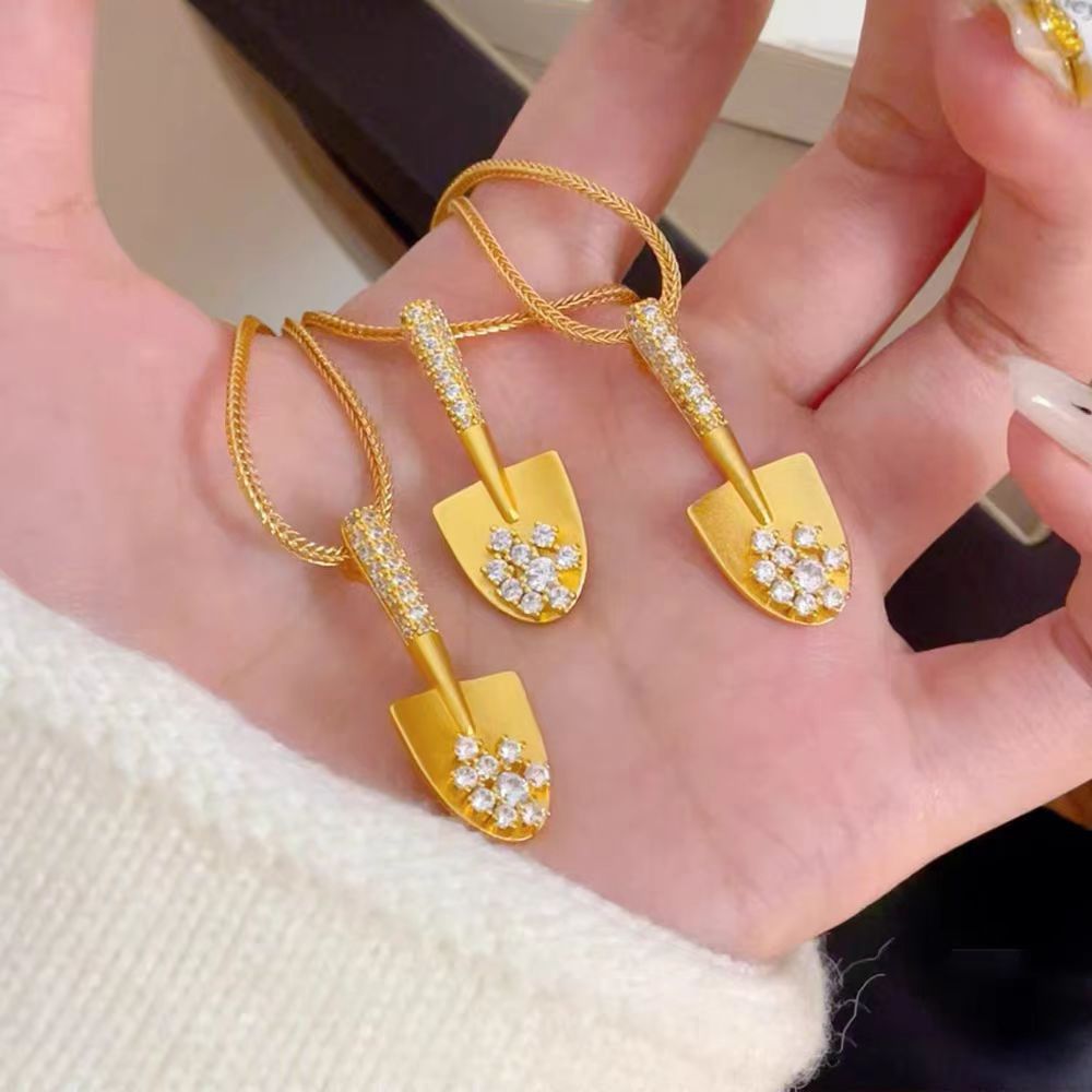 Damen Kette mit kunstvollem Schaufelanhänger und funkelnden Kristallen Shop Nory