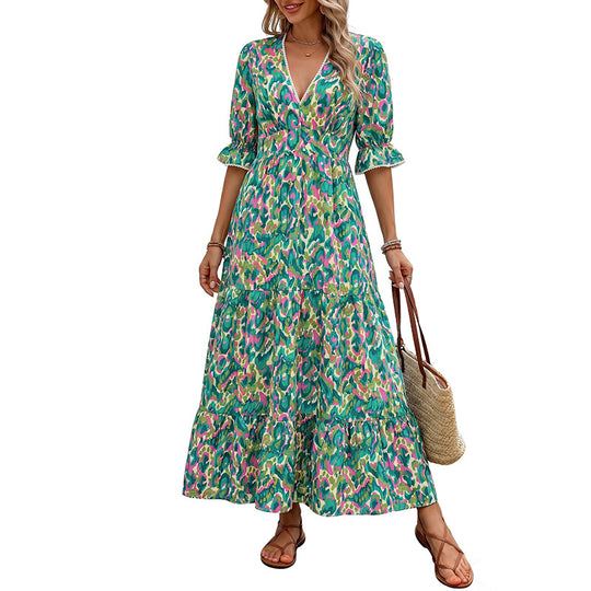 Damen Maxikleid mit buntem Aquarell-Print, V-Ausschnitt, tailliertem Smok-Bund und Stufenrock Shop Nory
