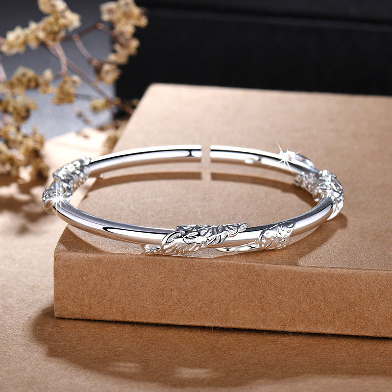 Damen Armreif mit kunstvoller Blumendekoration Shop Nory