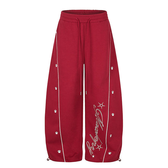 Damen Lockerfallende Palazzo‑Sweathose im Athleisure‑Look mit Tunnelzugbund und Script‑Print Shop Nory