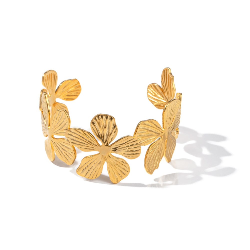Damen Offenes Armreif mit floralem Design aus hochwertigem Edelstahl Shop Nory