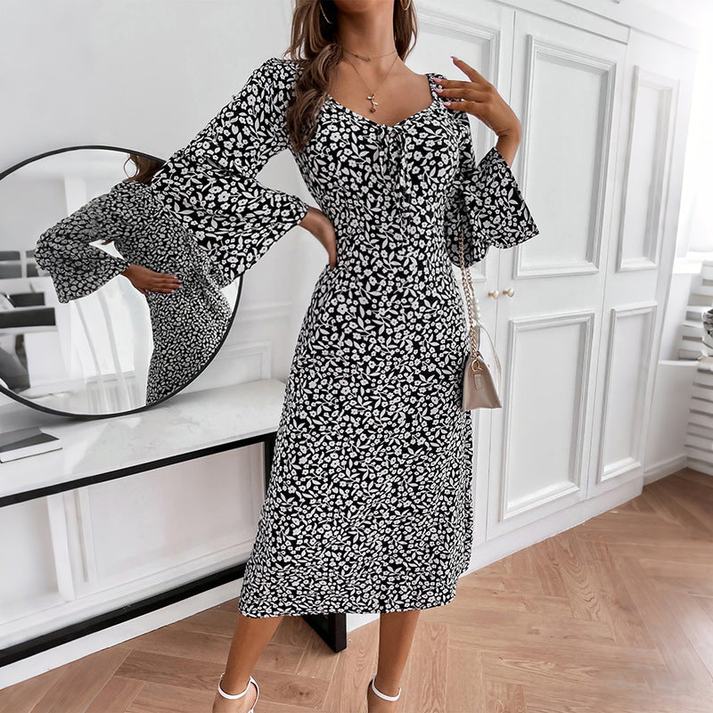 Damen Blumen-Midikleid mit taillierter Wickeloptik und ausgestellten Trompetenärmeln Shop Nory