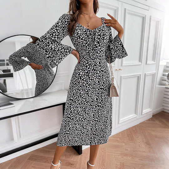 Damen Blumen-Midikleid mit taillierter Wickeloptik und ausgestellten Trompetenärmeln Shop Nory