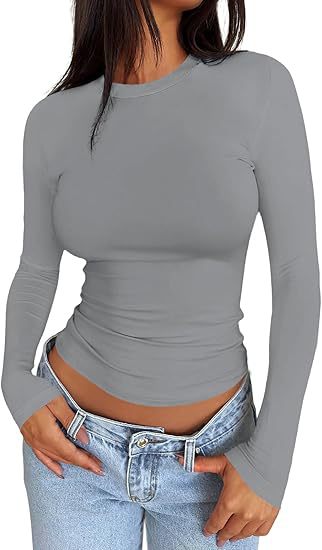 Damen Körpernahes Langarmshirt im Cropped-Look mit verlängerten Ärmeln und Daumenloch Shop Nory