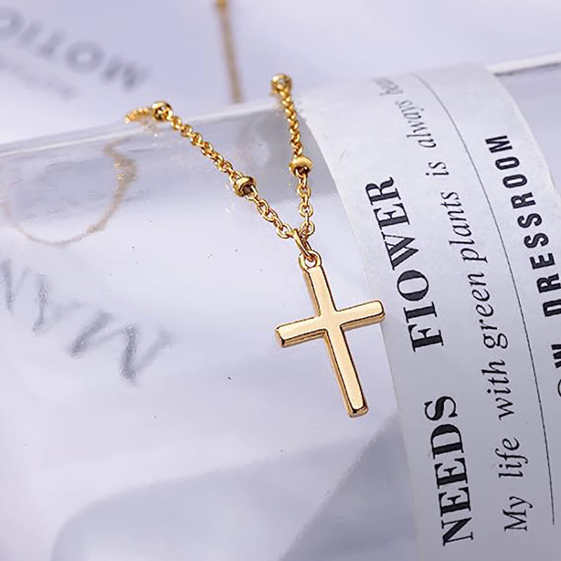 Damen Halskette mit elegantem Kreuzanhänger und feiner Gliederkette Shop Nory