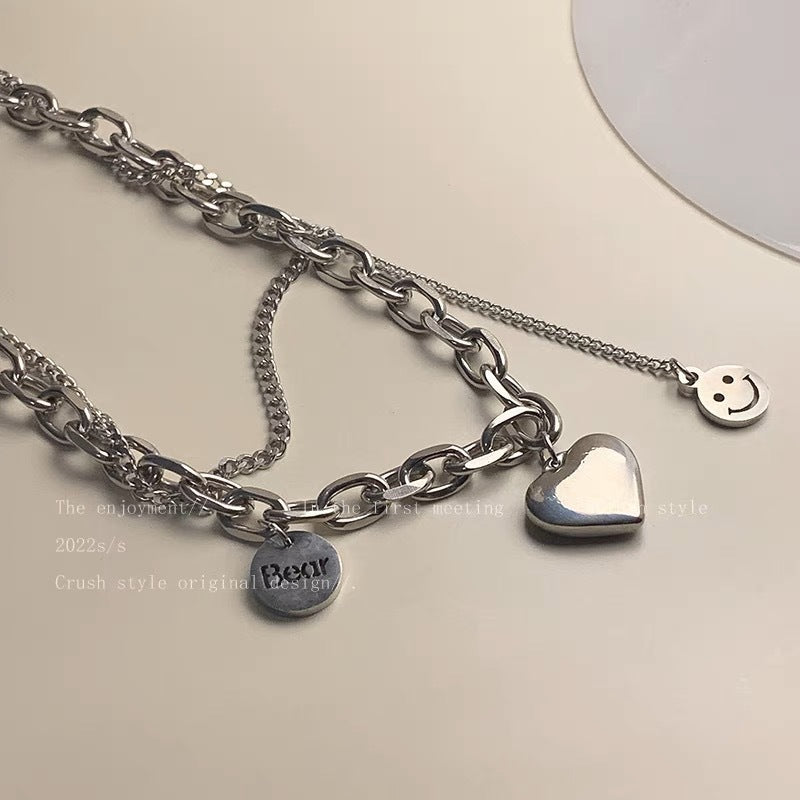 Damen Kette mit charmantem Herzen- und Smiley-Anhänger Shop Nory