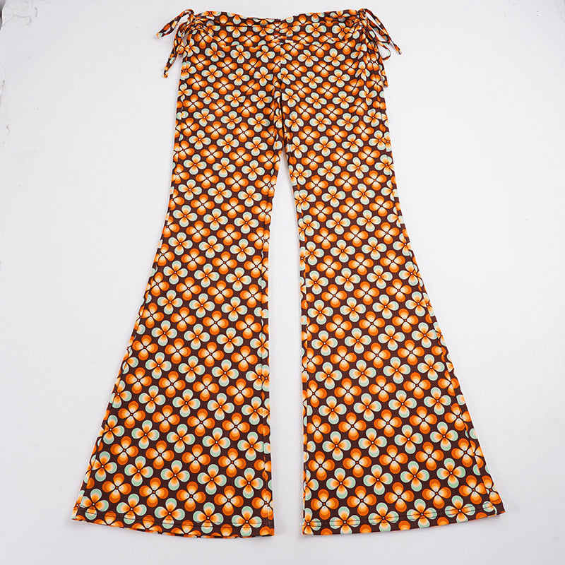 Damen nan ausgestellte Schlaghose mit hoher Taille, seitlichen Kordelzügen und retro Blumenprint Shop Nory