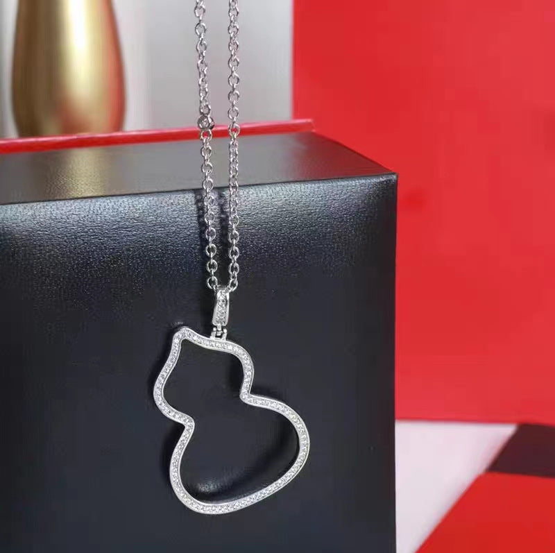 Damen Halskette mit verspieltem Design und funkelnden Akzenten Shop Nory
