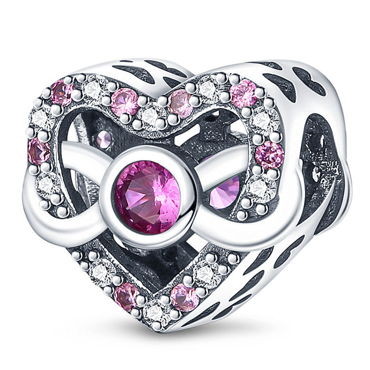 Filigraner Herz-Charms Anhänger mit Rosenmotiv und Zirkonia