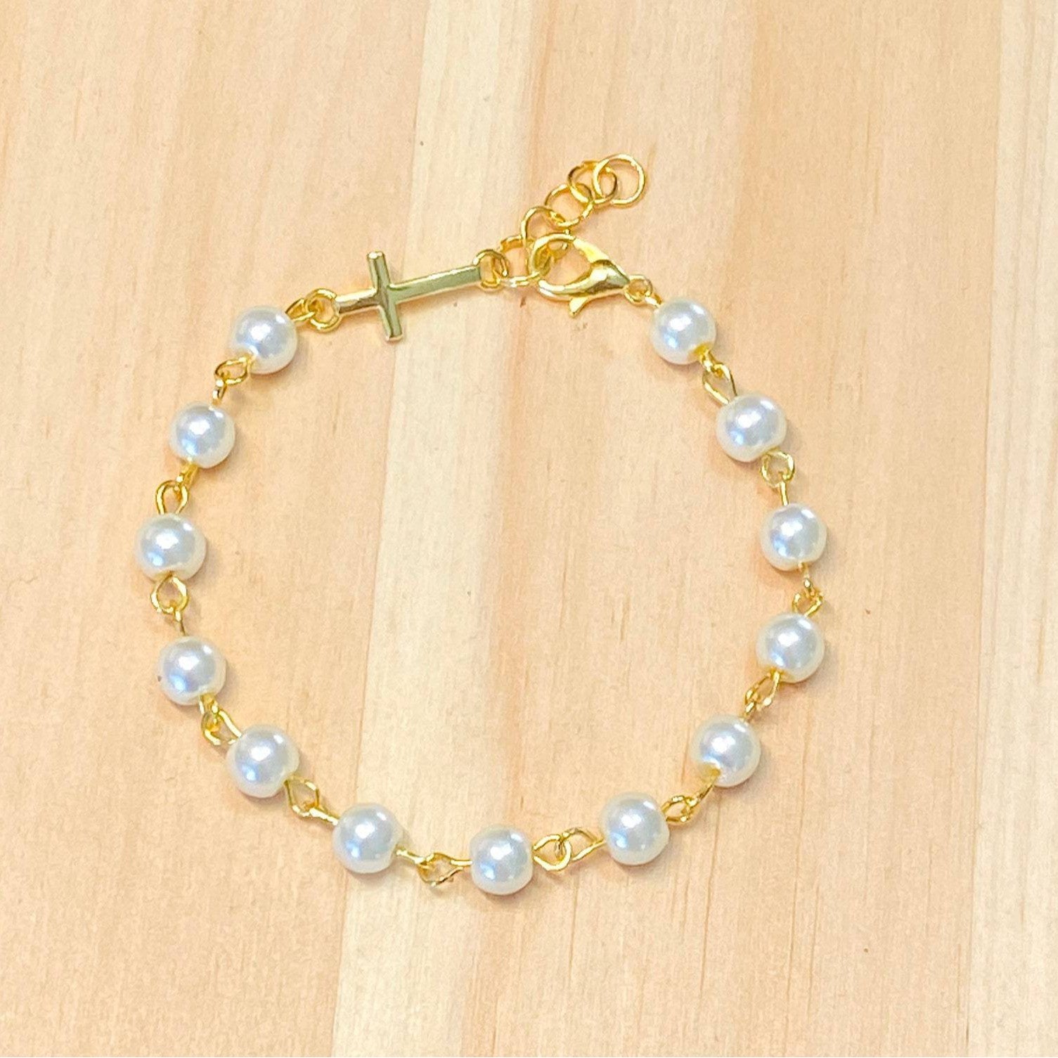 Damen Armband mit perlensicherem Kreuzanhänger Shop Nory