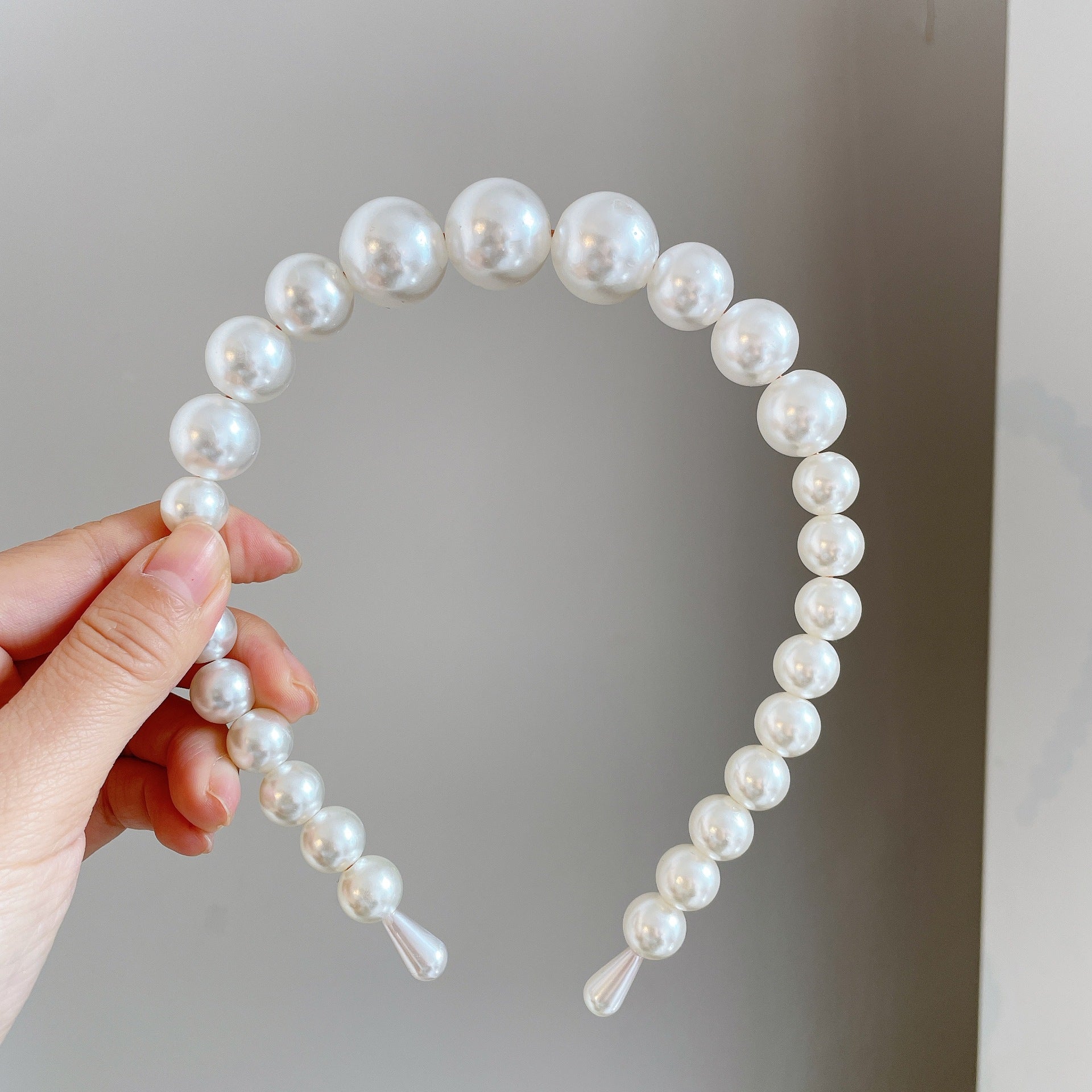 Damen Haarband mit eleganten Perlenakzenten Shop Nory