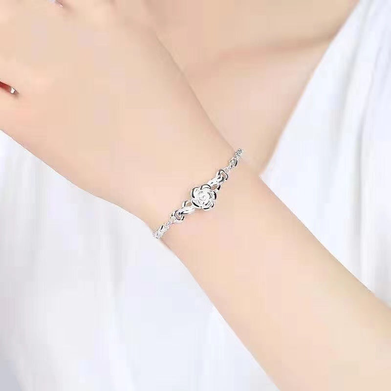 Damenarmband mit kunstvollem Blumen-Design und funkelndem Zirkonia Shop Nory