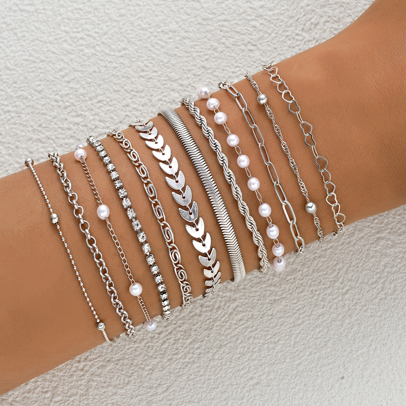 Damen Armband-Set mit filigranen Designs und funkelnden Zirkonia Shop Nory