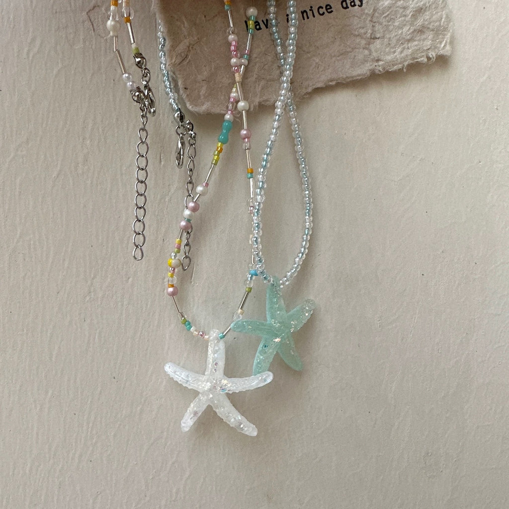 Damen Kette mit verspieltem Sternenanhänger und bunten Perlen Shop Nory