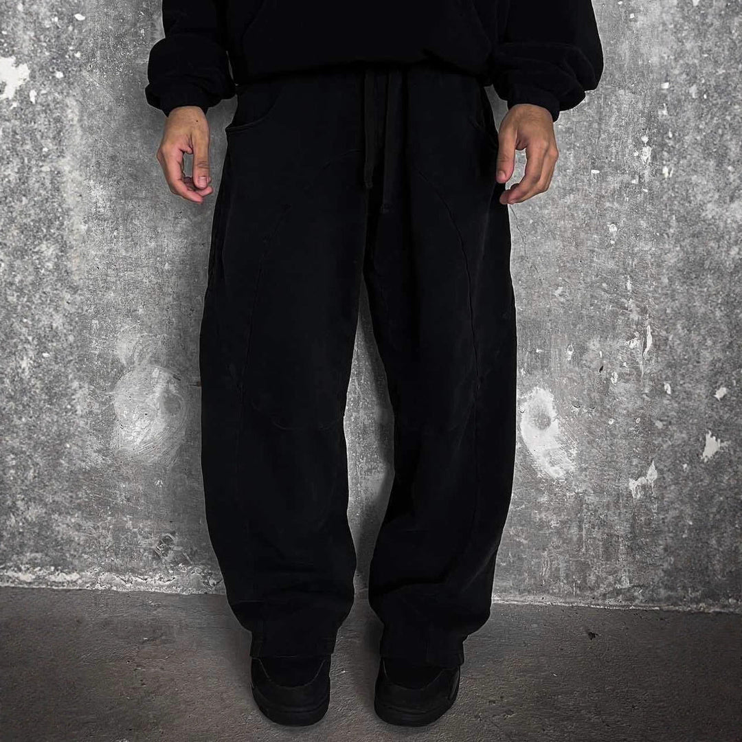 Herren nan Oversize-Freizeitjogger mit geschwungenen Nahtdetails, Kordelzugbund und elastischen Beinabschlüssen Shopnory