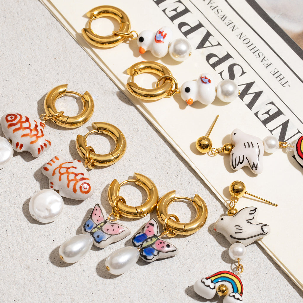 Damen Ohrhänger im verspielten Enten-Design mit Perlenschmuck und hypoallergener Edelstahlverarbeitung Shop Nory