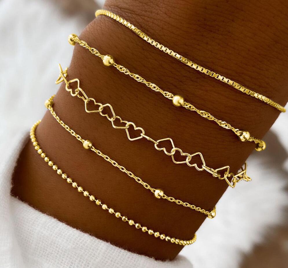 Damen Armreifen-Set mit zarten Herz- und Perlendetails Shop Nory