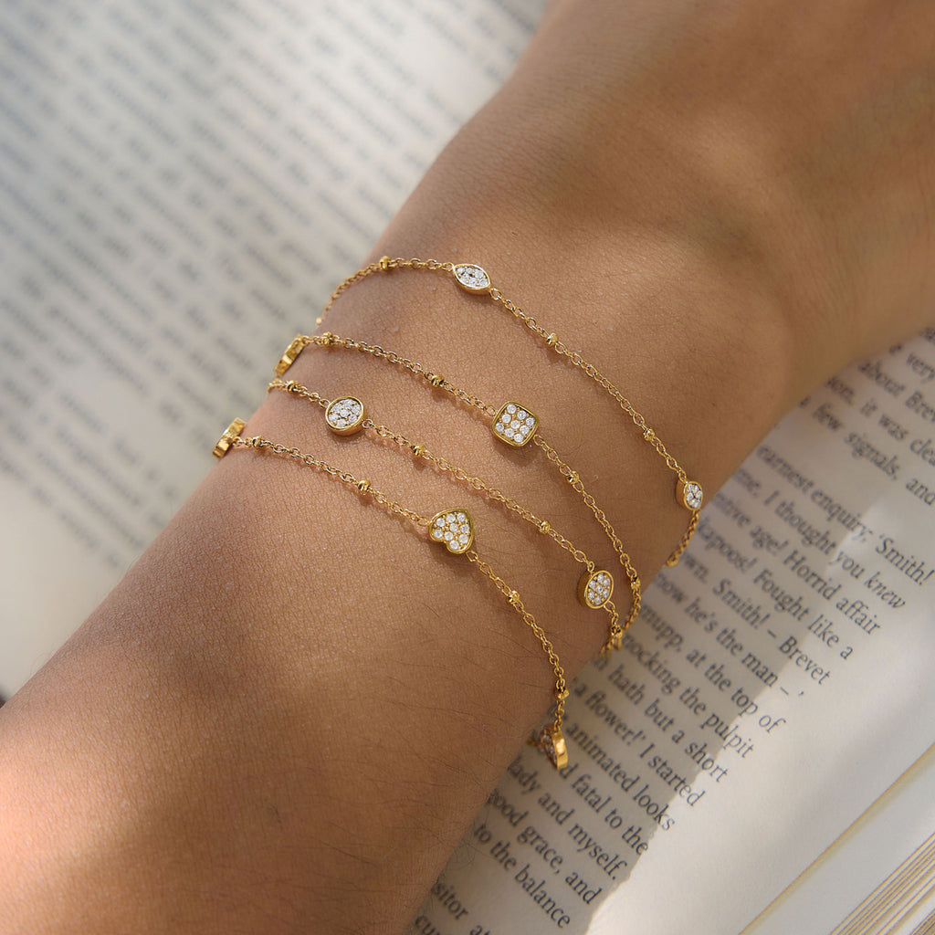 Damen Armband mit herzförmigen Anhängern und Zirkonia-Verzierung Shop Nory