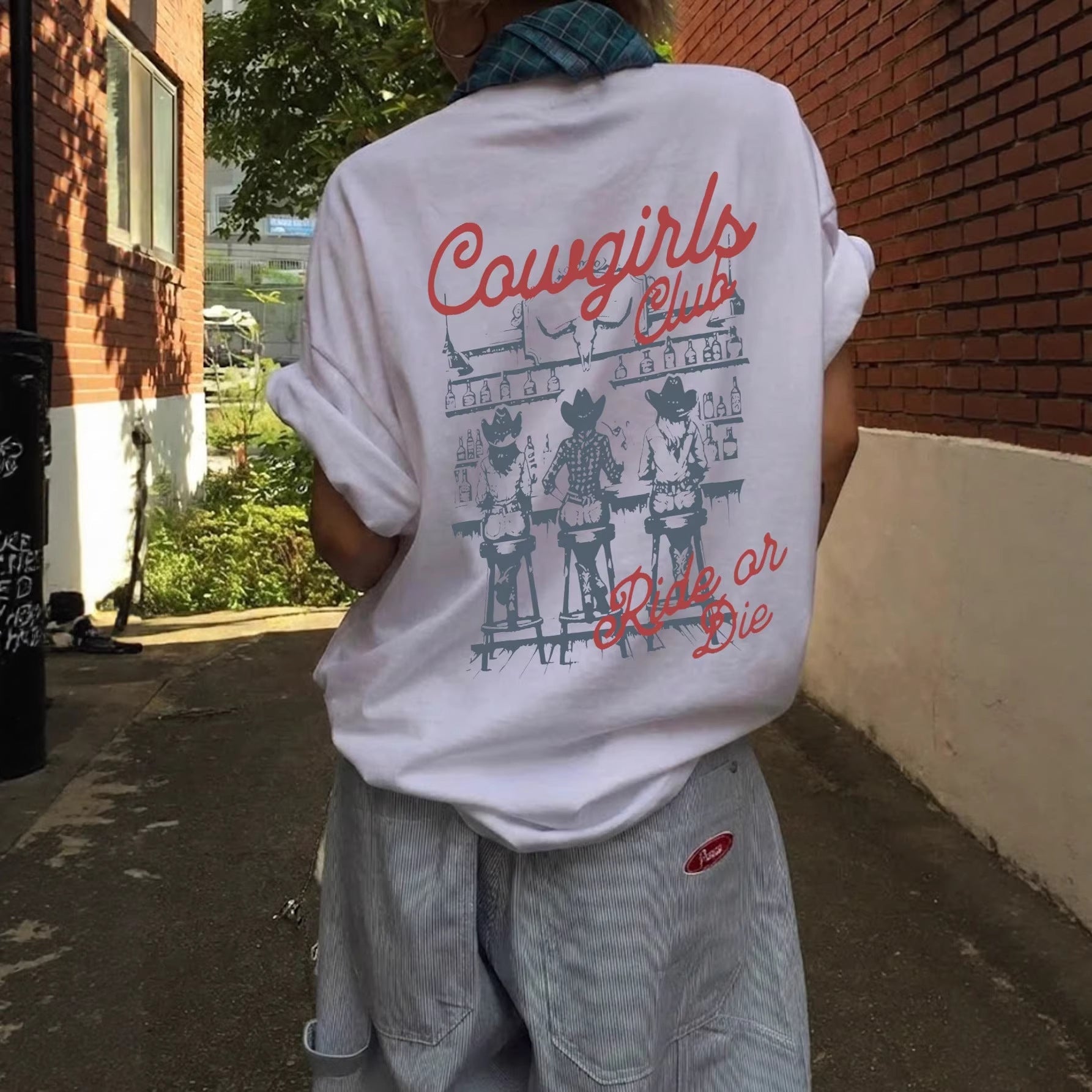 Damen Oversize T-Shirt mit Retro Cowgirl-Motiv Shopnory