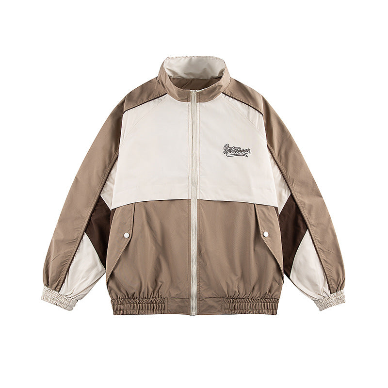 Unisex Kastig geschnittene Trackjacke im Retro-Sportstil mit hohem Stehkragen, Farbblock‑Einsätzen und elastischem Saum Shop Nory