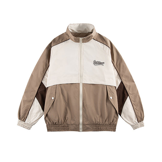Unisex Kastig geschnittene Trackjacke im Retro-Sportstil mit hohem Stehkragen, Farbblock‑Einsätzen und elastischem Saum Shop Nory