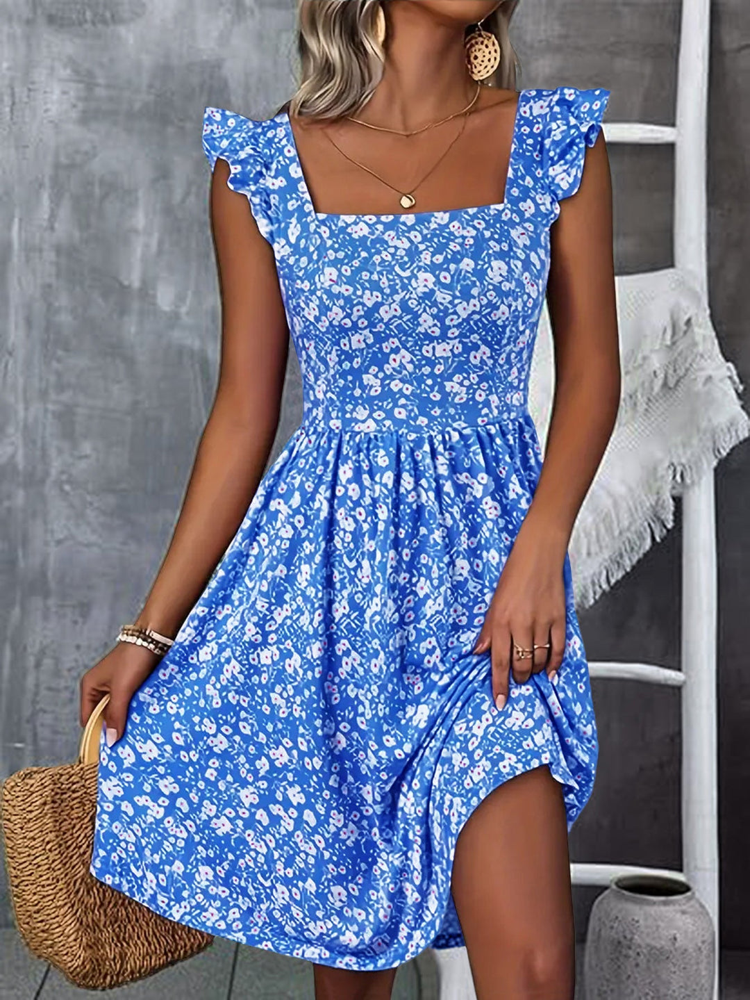 Damen Blumenkleid mit fließendem Rock und Rüschendetails