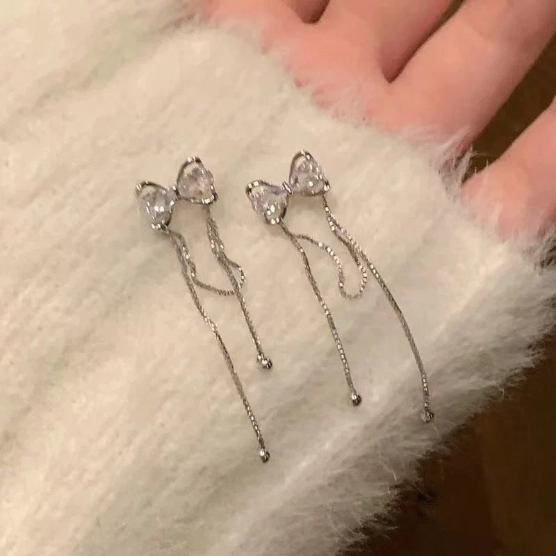 Damen Ohrstecker mit eleganten Schleifen und funkelnden Akzenten Shop Nory
