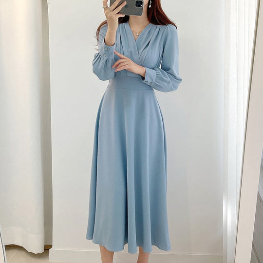 Elegantes Kleid mit Puffärmeln und V-Ausschnitt in A-Linie