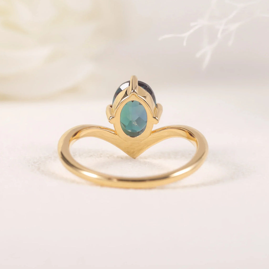 Alexandrit-Versprechensring, goldener, gebogener Ring mit Farbwechsel im Juni-Geburtsstein | Shop Nory