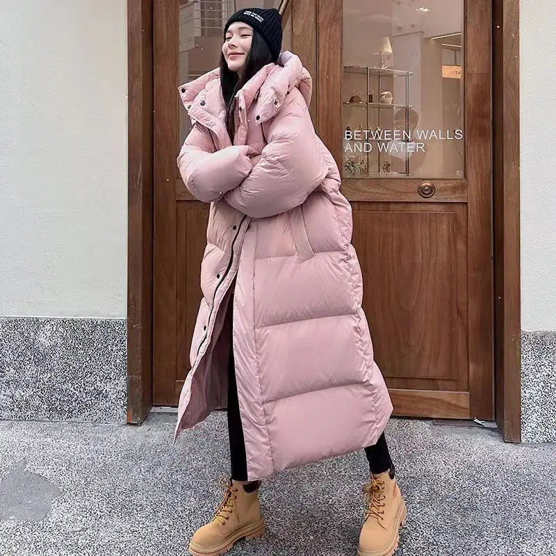 ShopNory | Lange Pufferjacke mit Kapuze für Damen - Winter