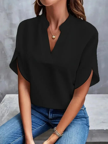Bluse mit V-Ausschnitt und Seitenschlitzen