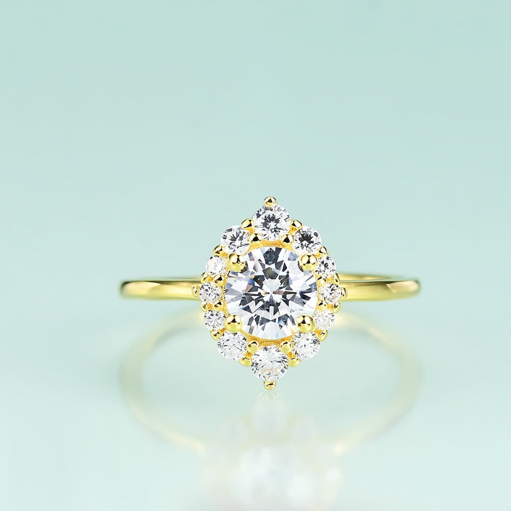 Moissanit-Solitärring mit Halo-Fassung im Rundschliff | Shop Nory