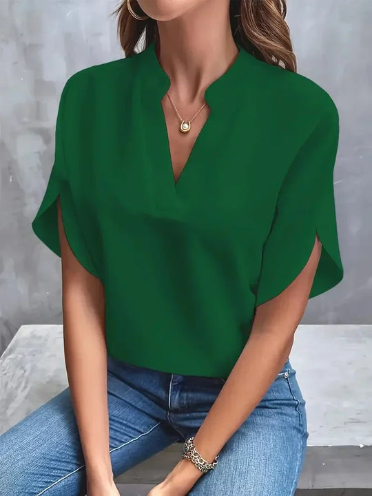 Bluse mit V-Ausschnitt und Seitenschlitzen
