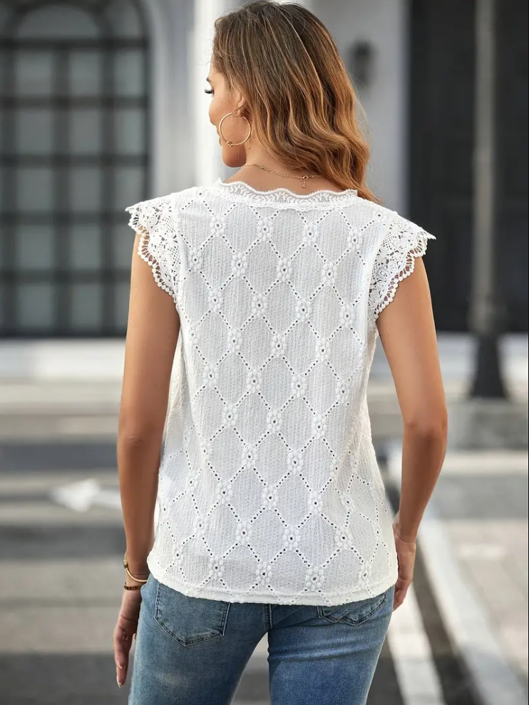 Shopnory | Top mit V-Ausschnitt und Stickerei