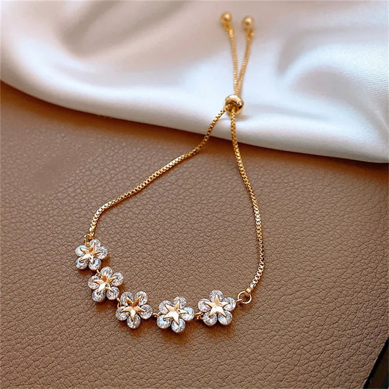 Elegante eingelegte Strassblumenarmbänder | Shop Nory
