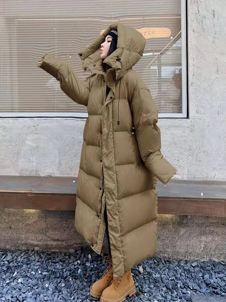 ShopNory | Lange Pufferjacke mit Kapuze für Damen - Winter