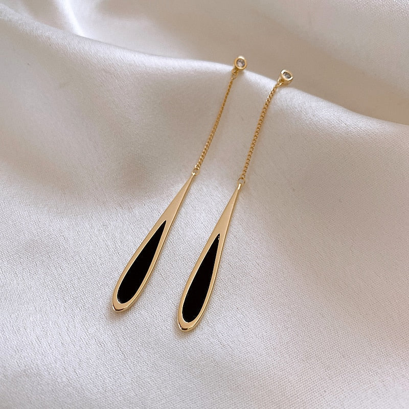 Lange Quaste | Lange Ohrringe mit schwarzer Quaste für Frauen | Shop Nory