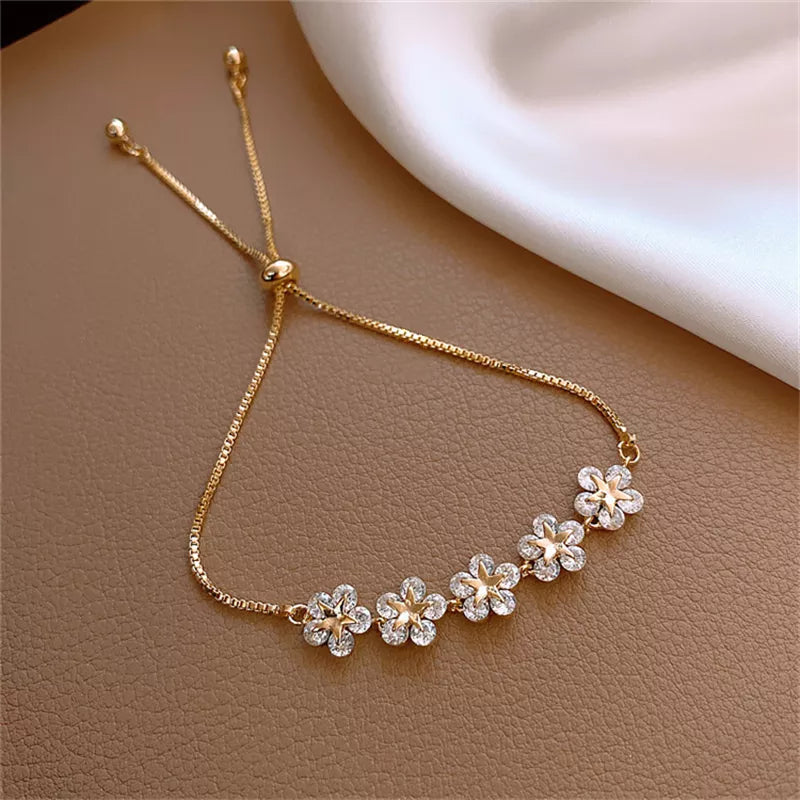 Elegante eingelegte Strassblumenarmbänder | Shop Nory