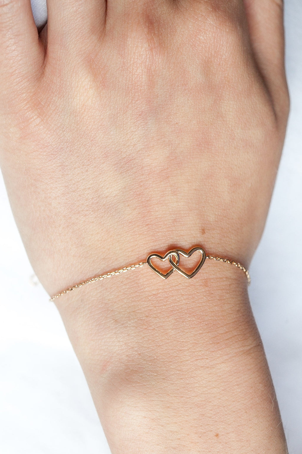 Verschlungenes Herzarmband vergoldet | Shop Nory