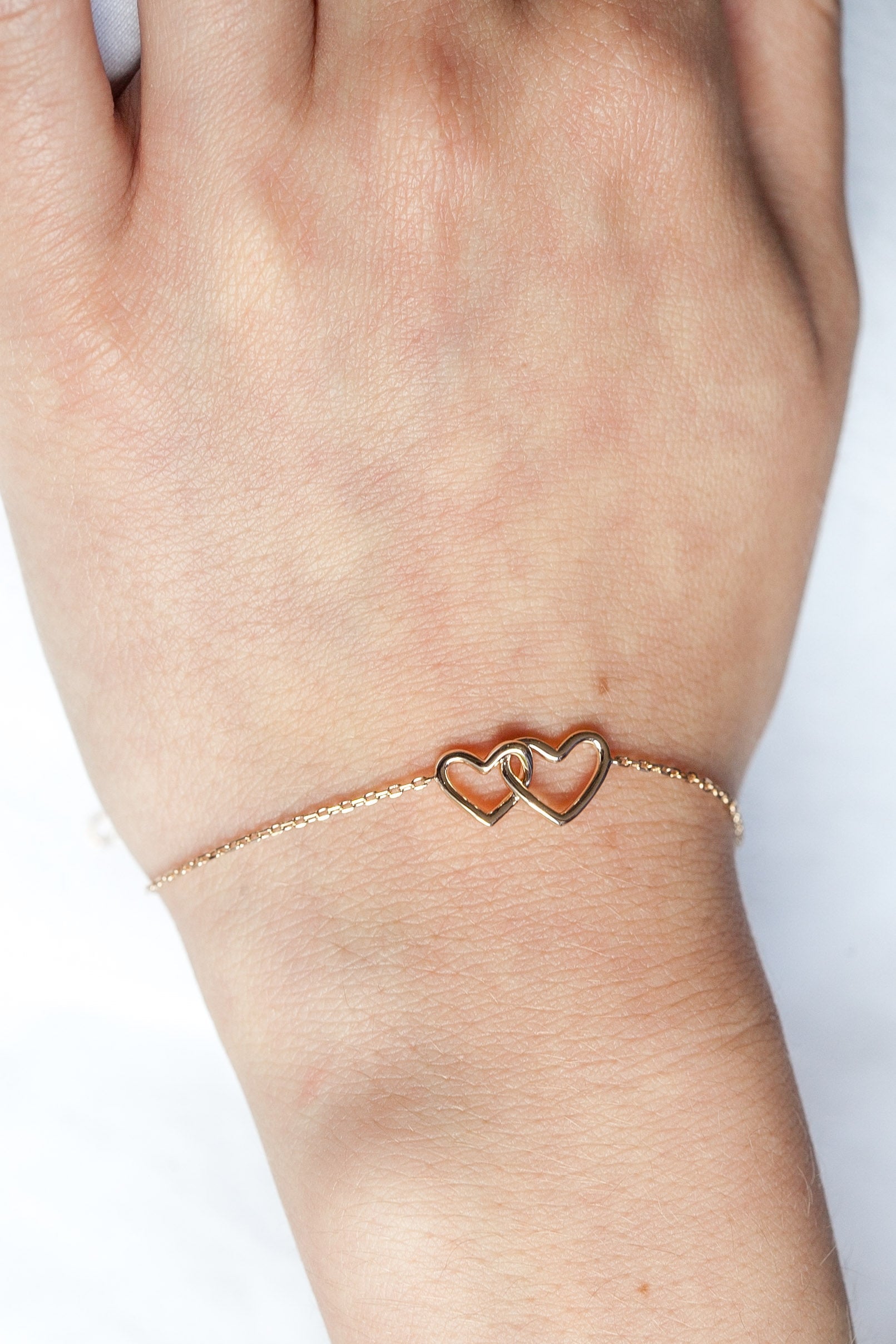 Verschlungenes Herzarmband vergoldet | Shop Nory