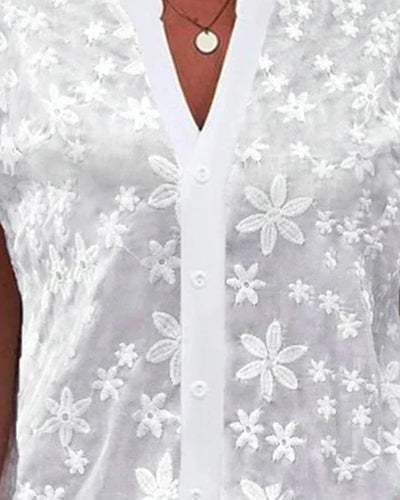 Kurzärmlige Blumenbluse mit V-Ausschnitt