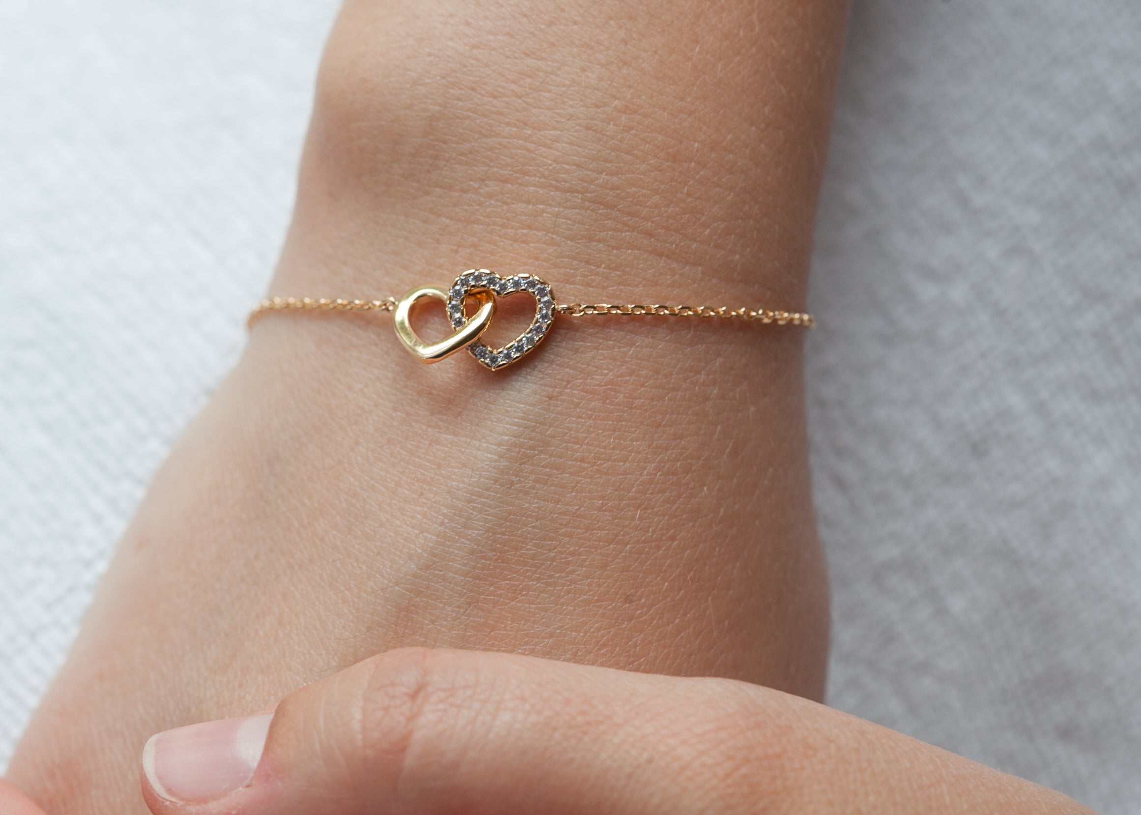 Armband zwei Herzen mit Zirkonia vergoldet | Shop Nory